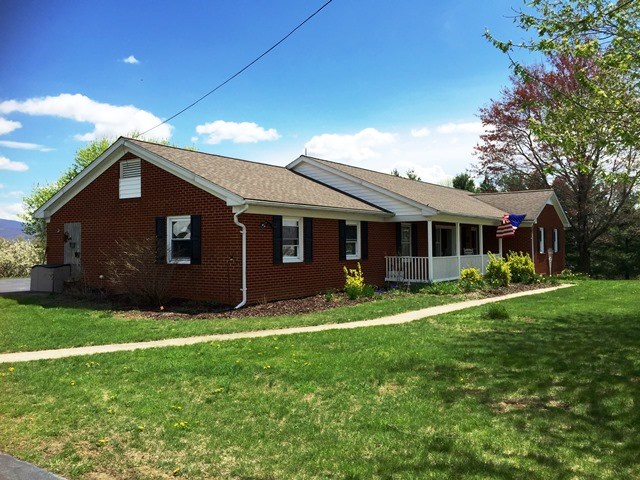 725 Brower Road Waynesboro, VA 22980 - Photo 3 of 47 a front view of a house with a garden