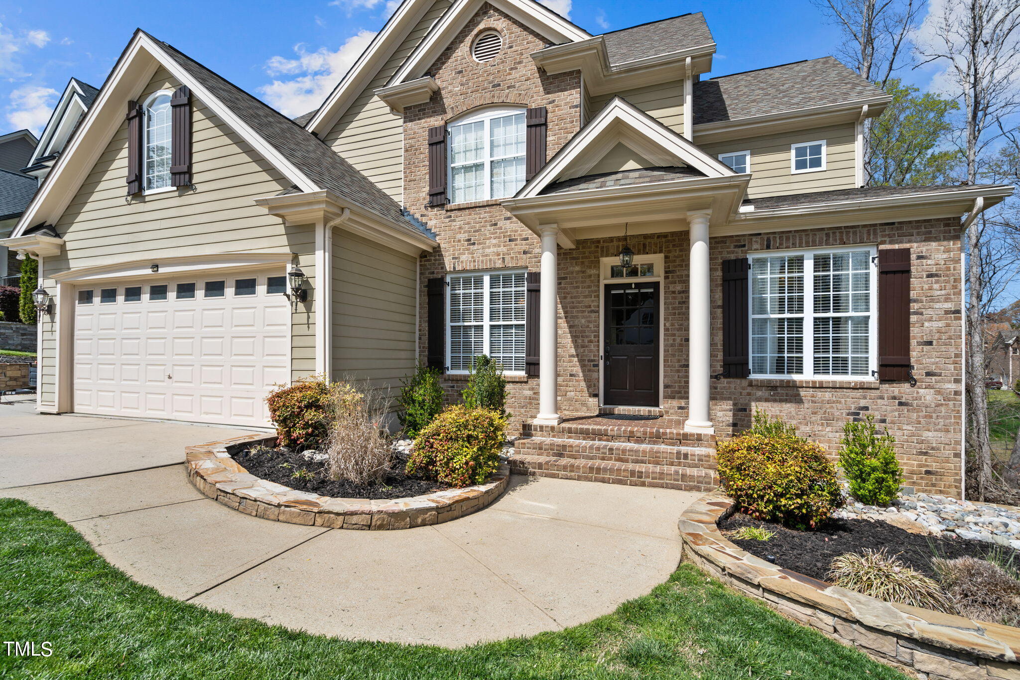 9306 Tabriz Point Raleigh, NC 27614 - Photo 3 of 46 a front view of a house