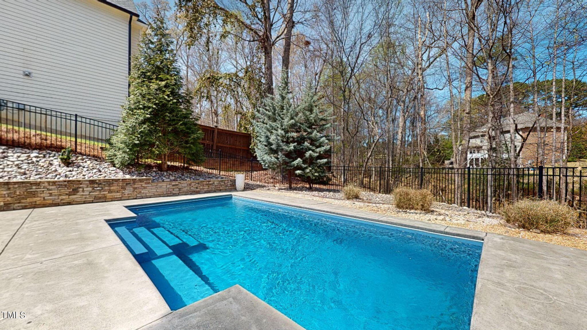 9306 Tabriz Point Raleigh, NC 27614 - Photo 42 of 46 a view of swimming pool with a patio