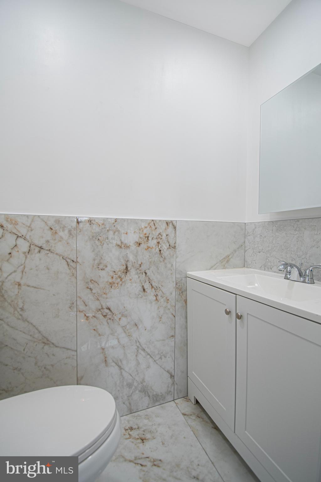 331 Westmoreland Drive Ewing, NJ 08618 - Photo 16 of 28 a bathroom with a toilet and a sink