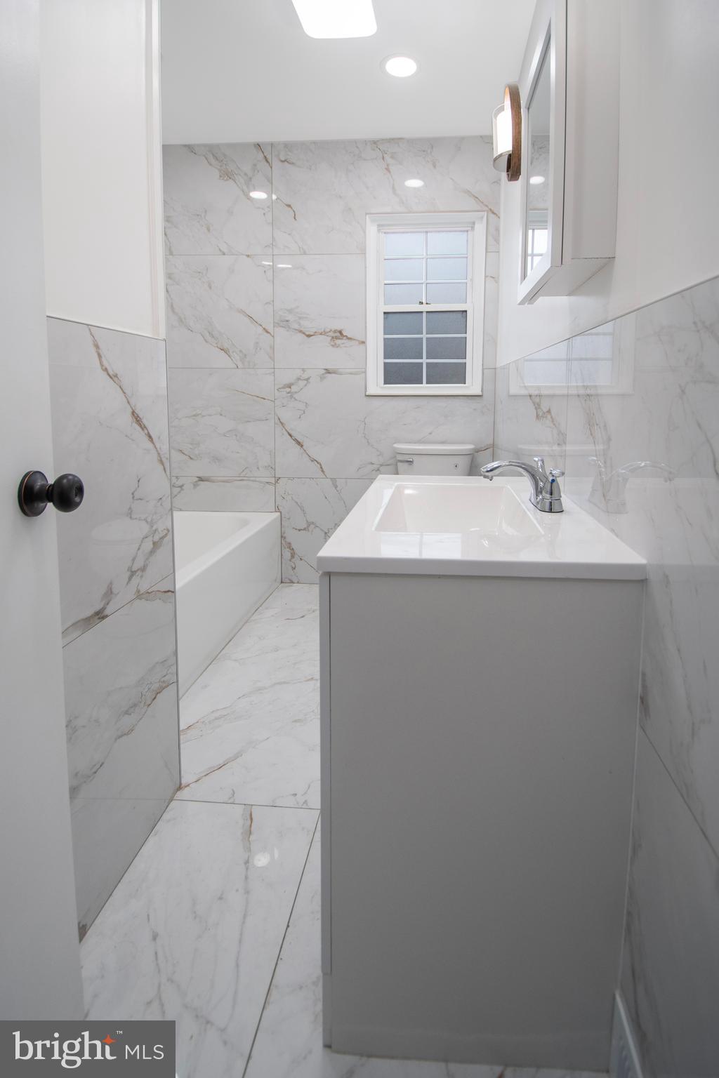 331 Westmoreland Drive Ewing, NJ 08618 - Photo 19 of 28 a bathroom with a sink and a shower