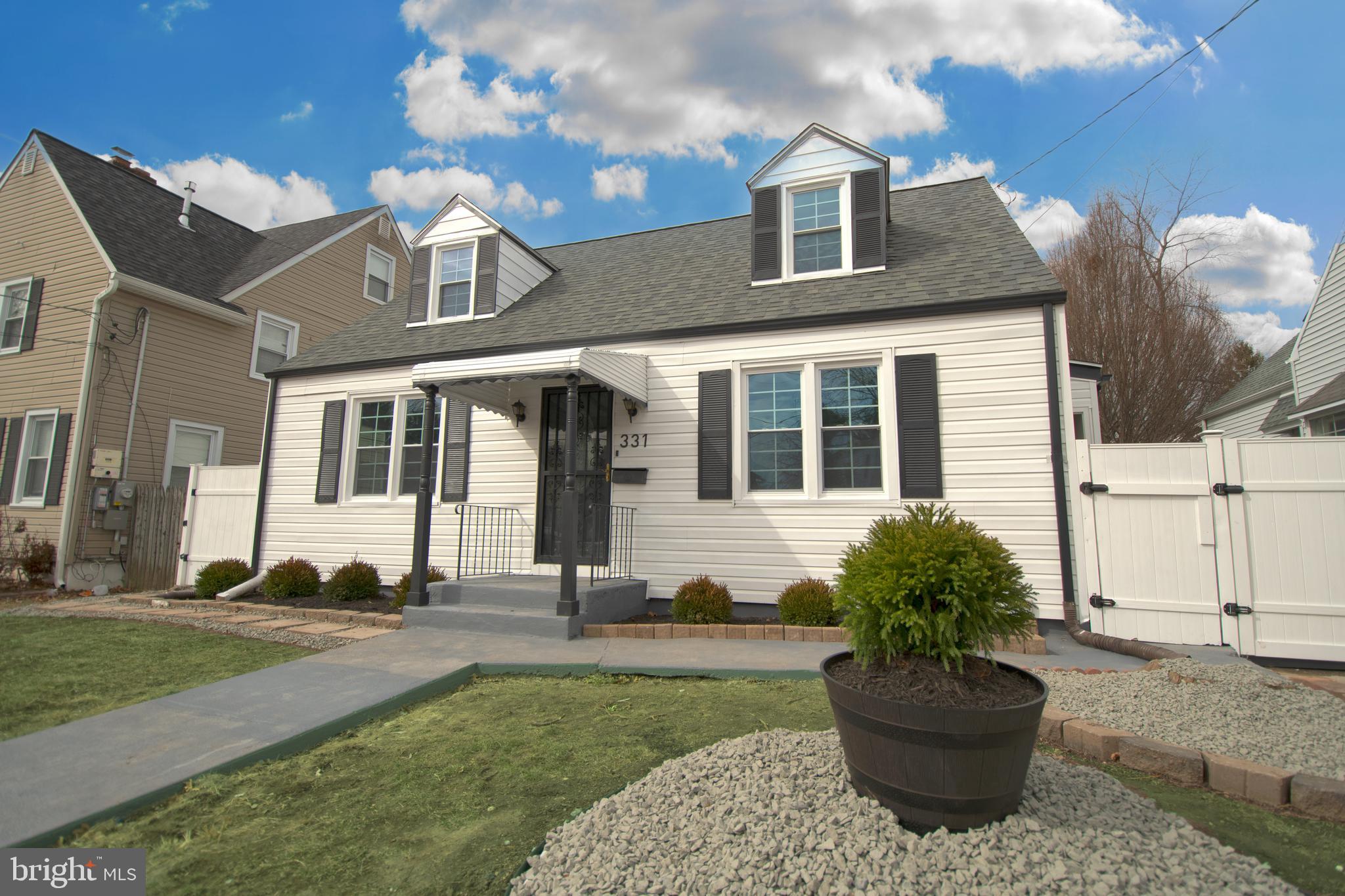 331 Westmoreland Drive Ewing, NJ 08618 - Photo 28 of 28 a front view of a house with garden