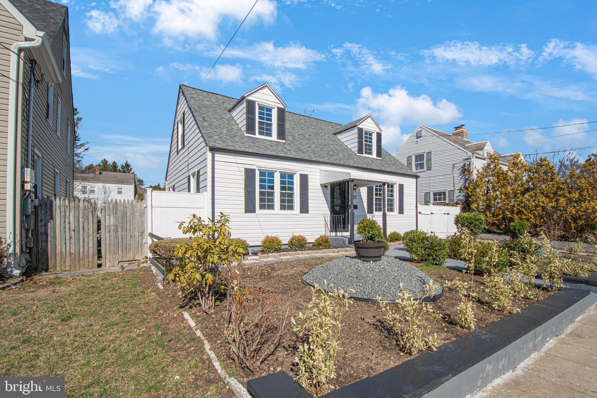 331 Westmoreland Drive Ewing, NJ 08618 - Photo 3 of 28 a front view of a house with garden