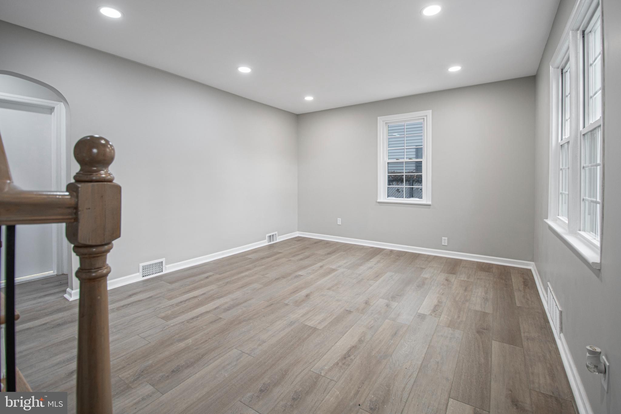 331 Westmoreland Drive Ewing, NJ 08618 - Photo 6 of 28 a view of empty room with wooden floor and fan