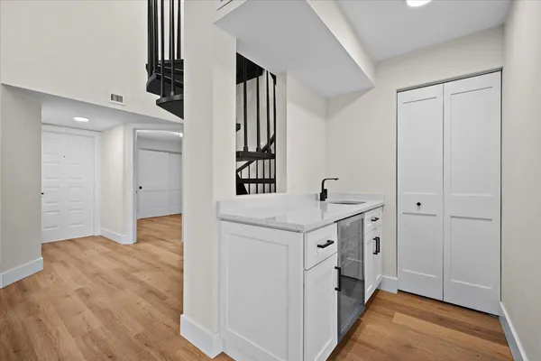 a view of hallway with washer and dryer