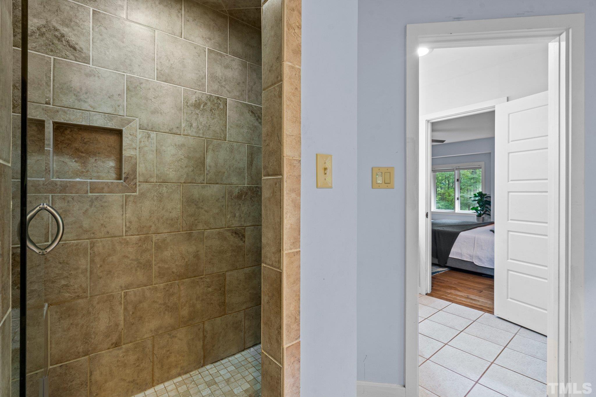 6509 Deerview Drive Raleigh, NC 27606 - Photo 15 of 36 a bathroom with a sink and a toilet
