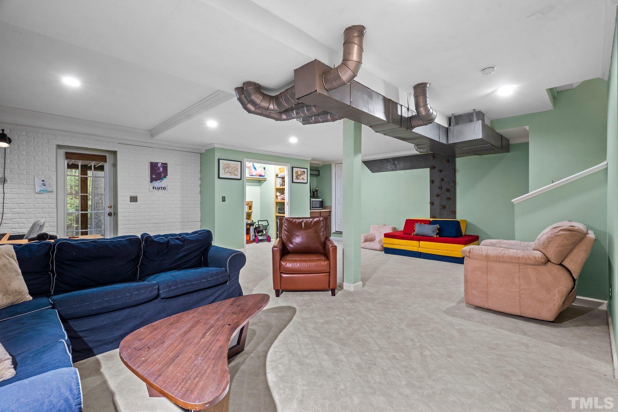6509 Deerview Drive Raleigh, NC 27606 - Photo 22 of 36 a living room with furniture