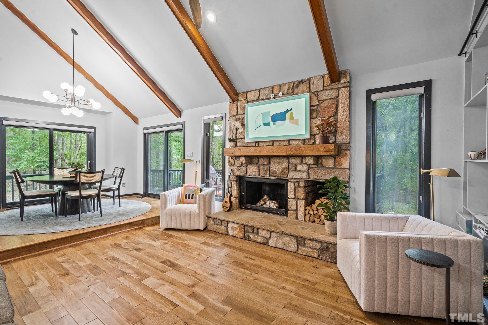 6509 Deerview Drive Raleigh, NC 27606 - Photo 3 of 36 a living room with furniture and a fireplace