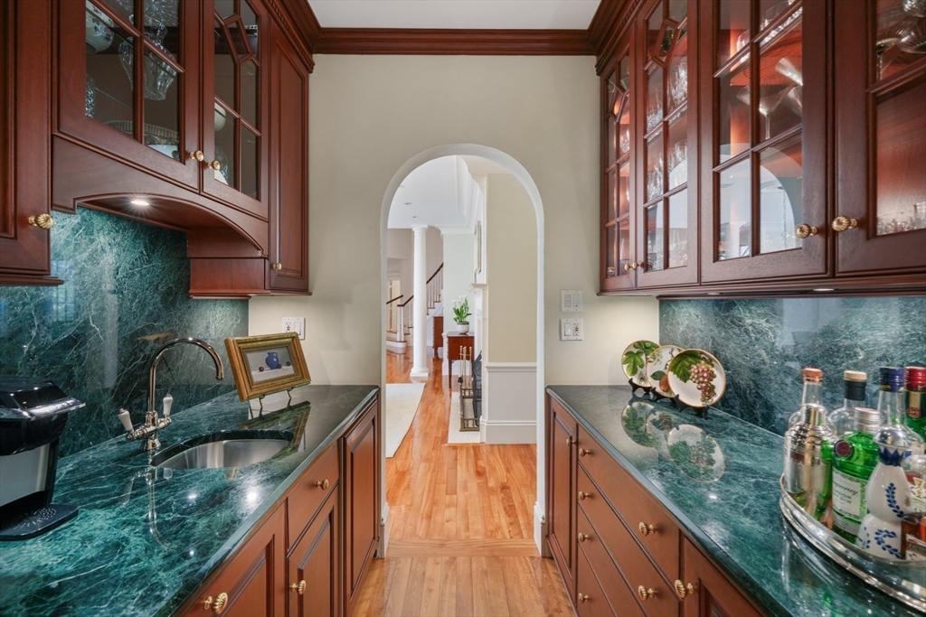 1 Old Farm Road Wellesley, MA 02481 - Photo 16 of 41 a kitchen with stainless steel appliances granite countertop a stove a sink and dishwasher