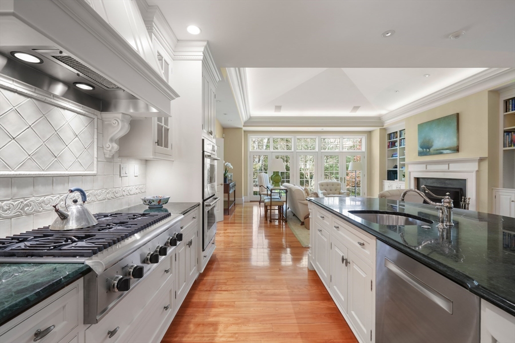 1 Old Farm Road Wellesley, MA 02481 - Photo 17 of 41 a large kitchen with stainless steel appliances granite countertop a lot of counter space and a sink