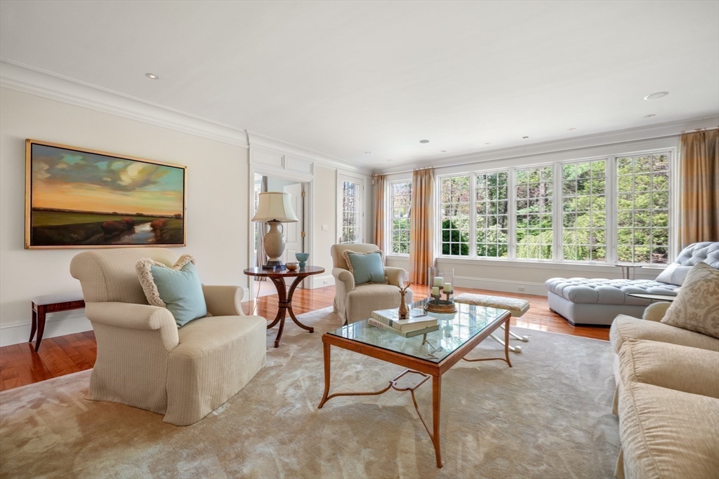 1 Old Farm Road Wellesley, MA 02481 - Photo 27 of 41 a living room with furniture and a flat screen tv