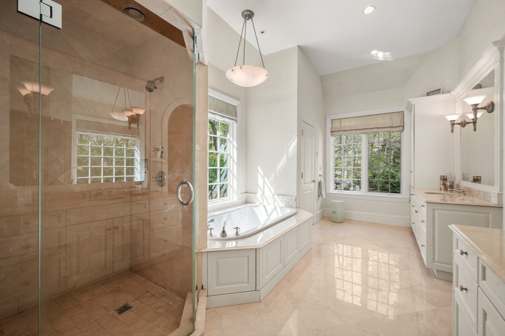 1 Old Farm Road Wellesley, MA 02481 - Photo 32 of 41 a spacious bathroom with a tub shower and windows