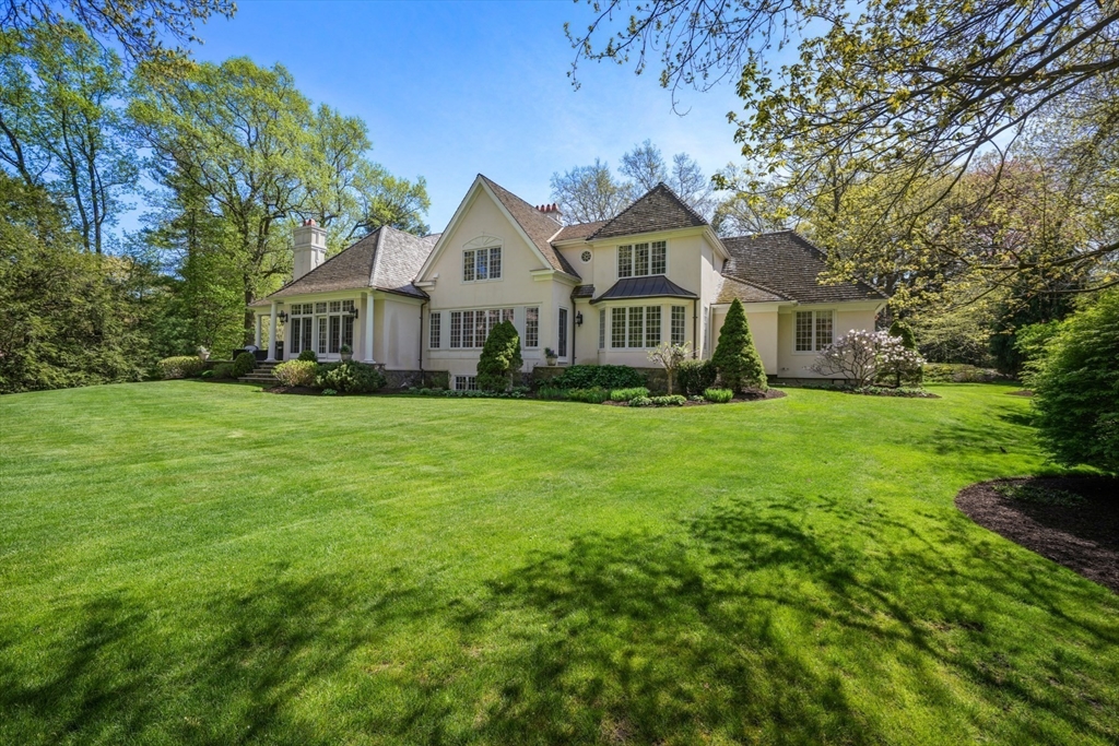 1 Old Farm Road Wellesley, MA 02481 - Photo 5 of 41 a front view of a house with a yard