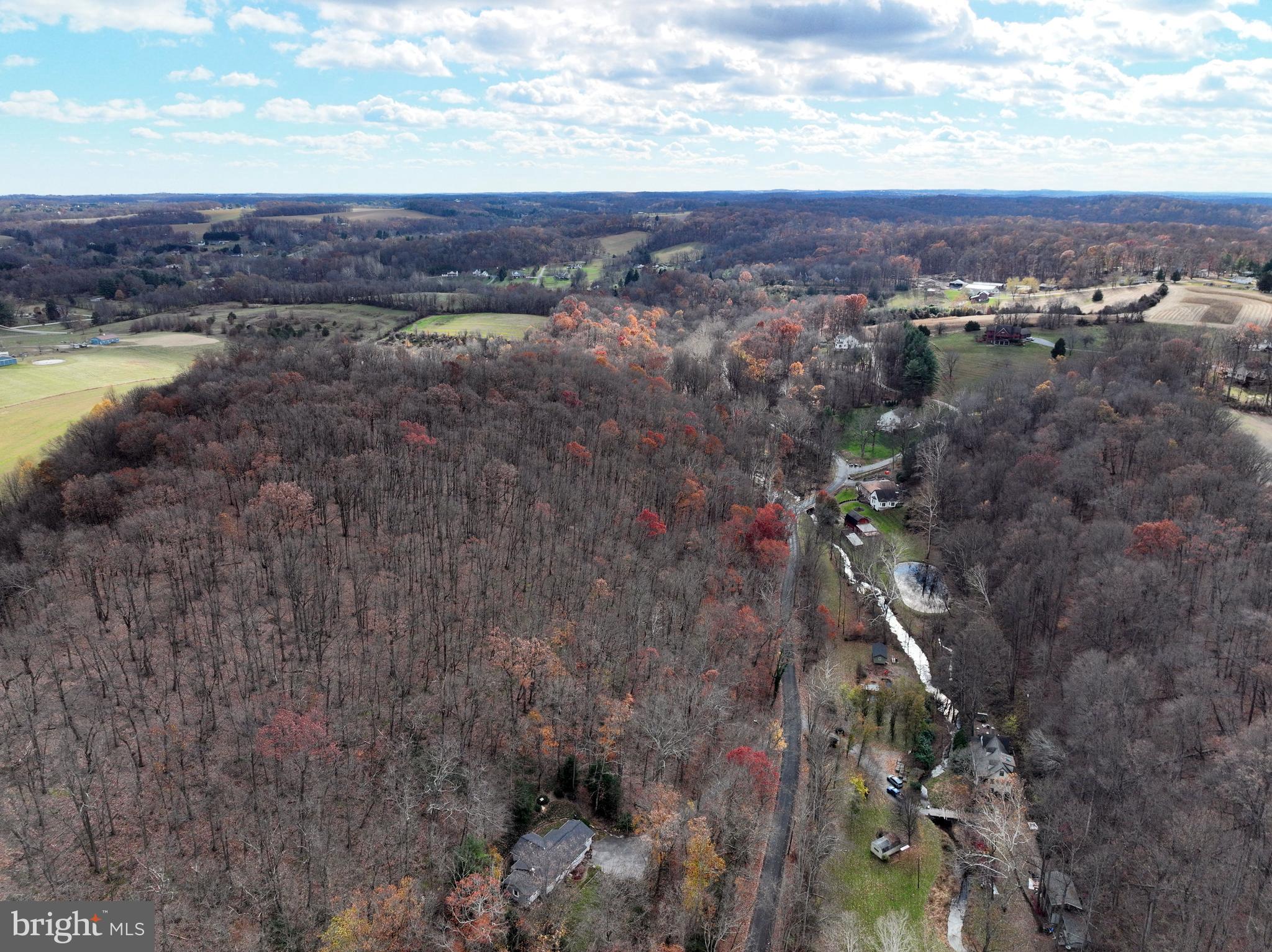 0 Sams Creek Road Westminster, MD 21157 - Photo 6 of 9 a view of a lake with mountains in the background