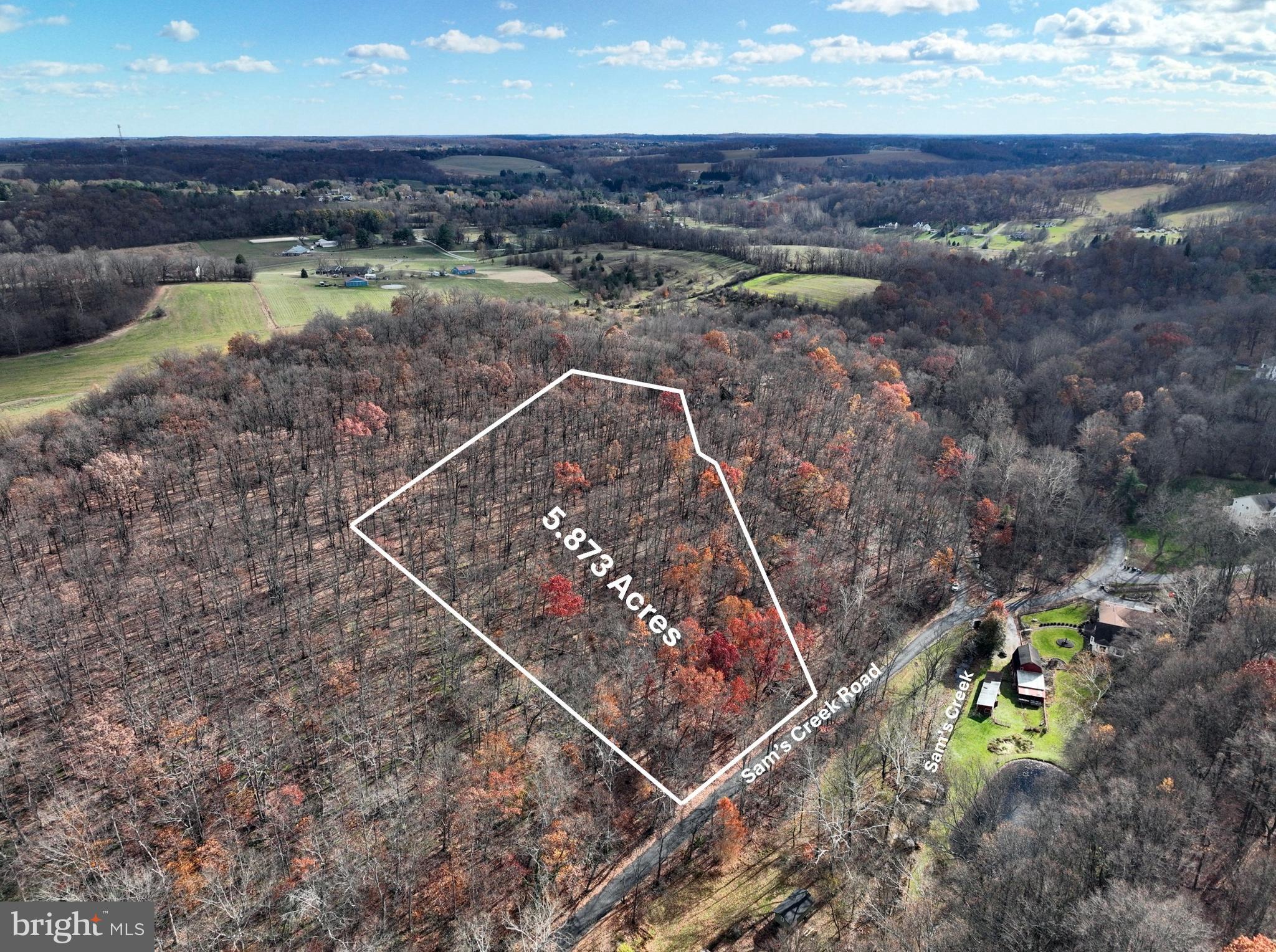0 Sams Creek Road Westminster, MD 21157 - Photo 7 of 9 a view of a lake with a mountain