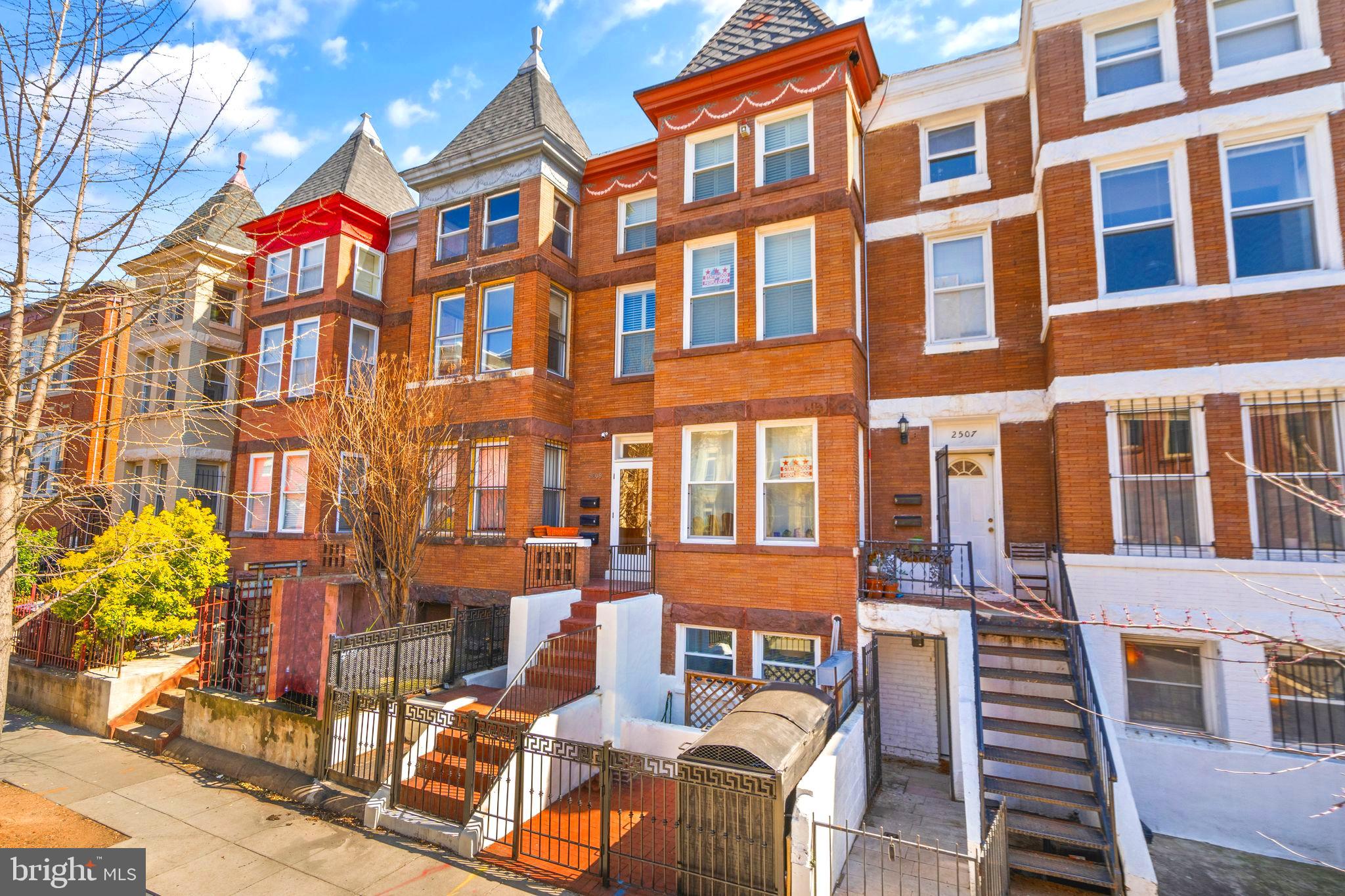 2509 17th Street Northwest, Unit 1 Washington, DC 20009 - Photo 15 of 23 a front view of a multi story residential apartment building