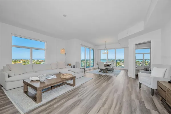 a living room with furniture and a table