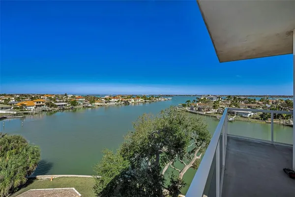 a view of a balcony with an ocean view