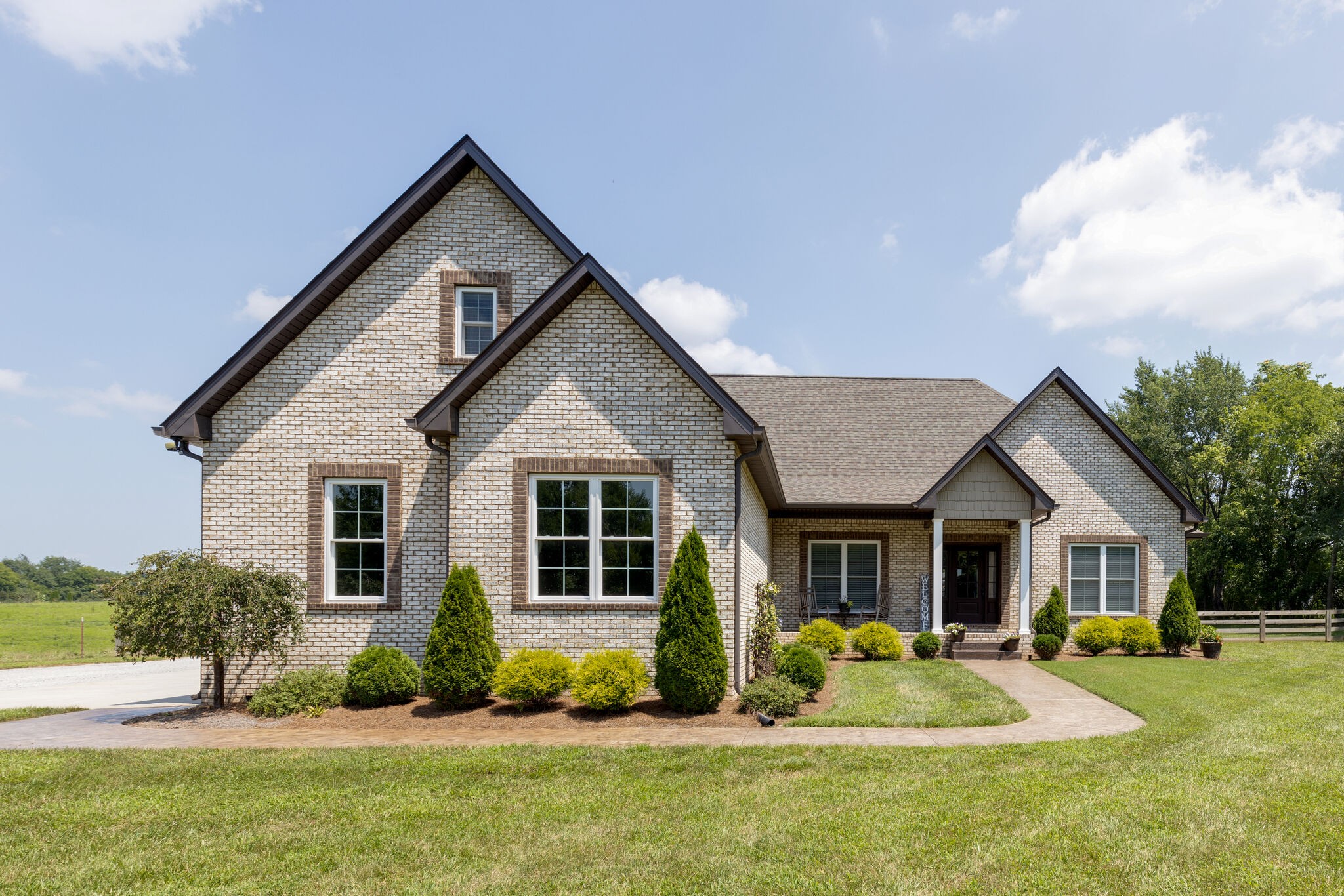 3165 Les Chappell Road Spring Hill, TN 37174 - Photo 1 of 70 a front view of a house with a yard and porch