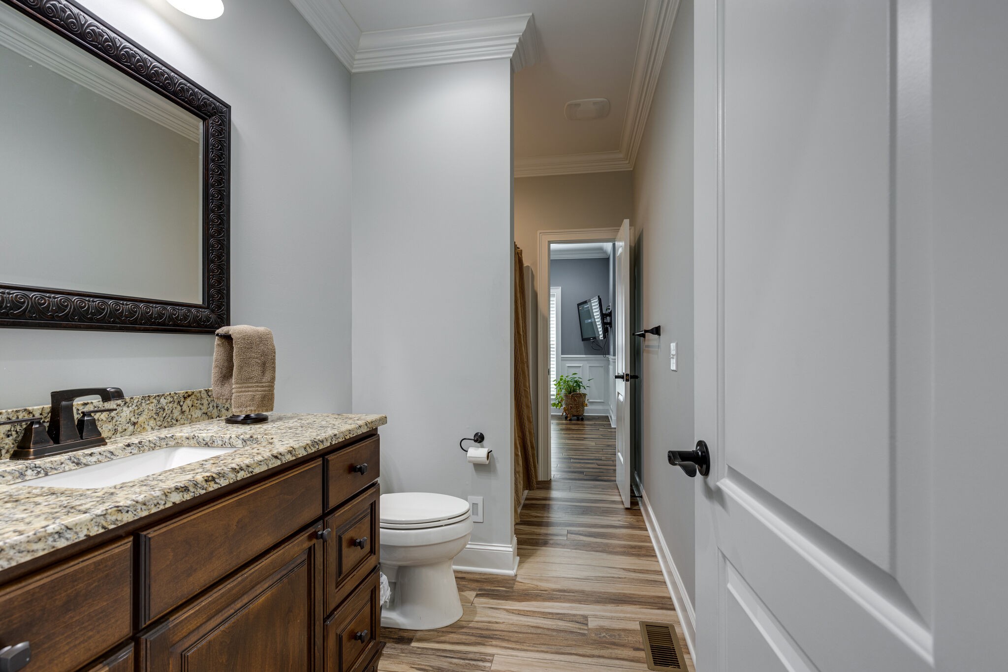 3165 Les Chappell Road Spring Hill, TN 37174 - Photo 20 of 70 a bathroom with a granite countertop sink toilet and shower