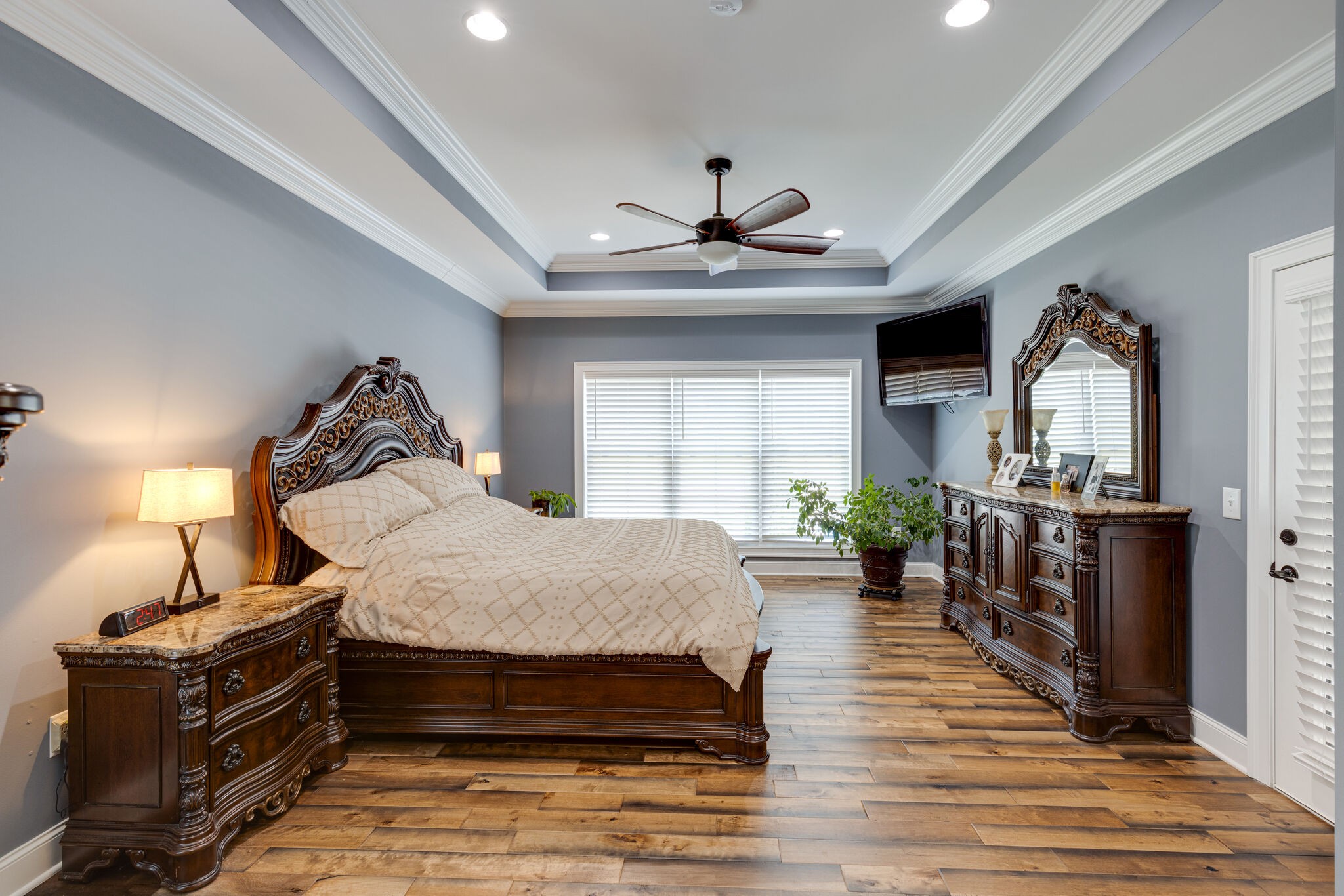 3165 Les Chappell Road Spring Hill, TN 37174 - Photo 21 of 70 a spacious bedroom with a bed and ceiling fan