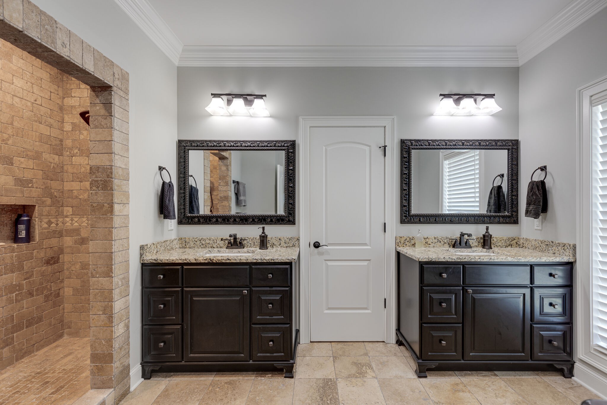 3165 Les Chappell Road Spring Hill, TN 37174 - Photo 24 of 70 a bathroom with a double vanity sink and a mirror