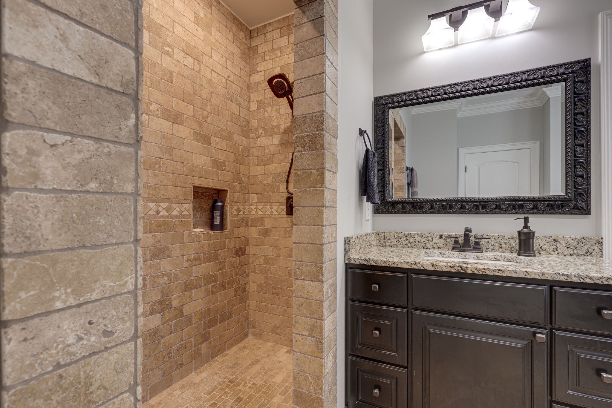 3165 Les Chappell Road Spring Hill, TN 37174 - Photo 27 of 70 a bathroom with a double vanity sink mirror and