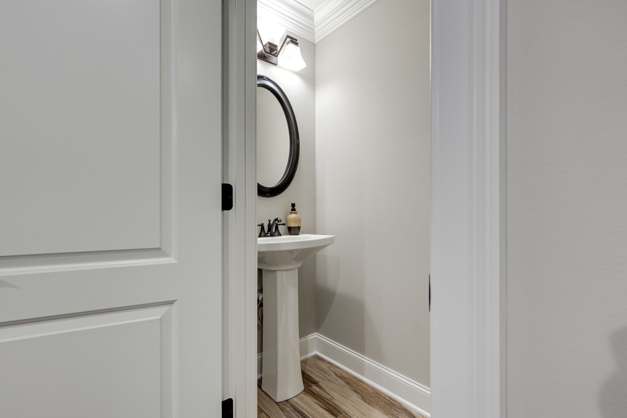 3165 Les Chappell Road Spring Hill, TN 37174 - Photo 33 of 70 a bathroom with a sink and mirror