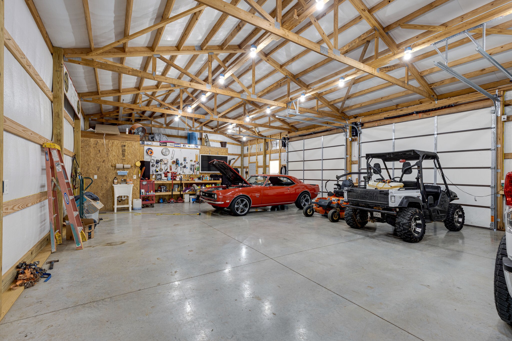 3165 Les Chappell Road Spring Hill, TN 37174 - Photo 45 of 70 a view of a garage with parked cars
