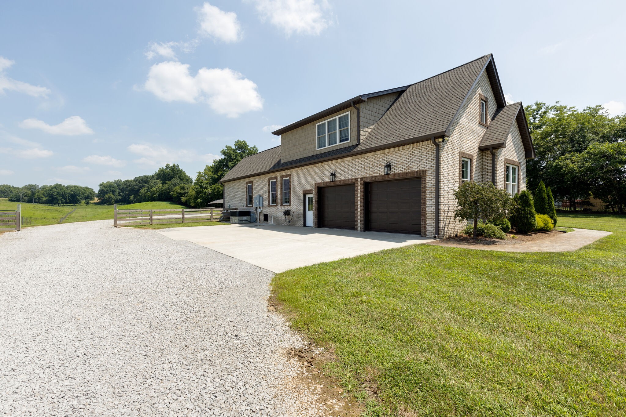 3165 Les Chappell Road Spring Hill, TN 37174 - Photo 48 of 70 a front view of a house with a yard and garage