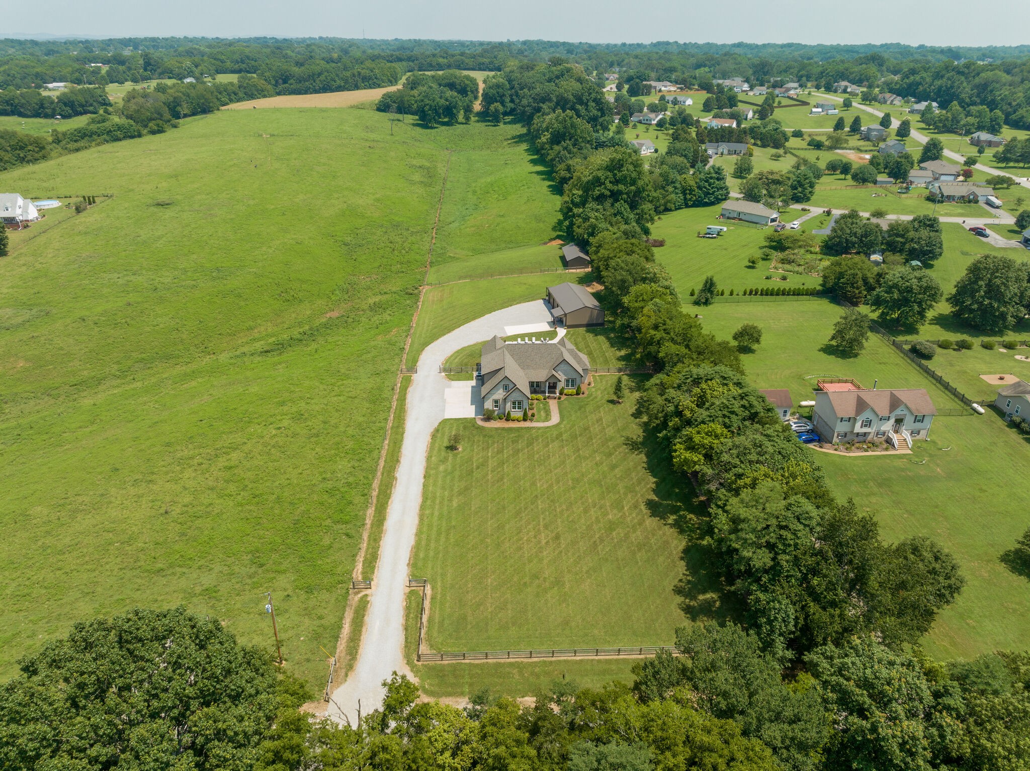 3165 Les Chappell Road Spring Hill, TN 37174 - Photo 60 of 70 an aerial view of a residential houses with outdoor space and trees all around