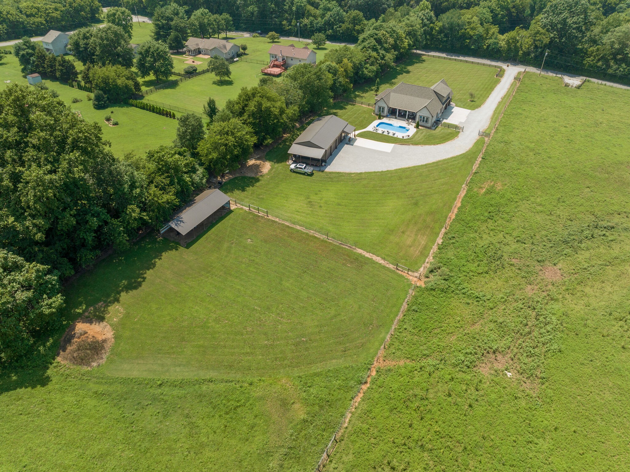3165 Les Chappell Road Spring Hill, TN 37174 - Photo 63 of 70 a view of a swimming pool with a yard