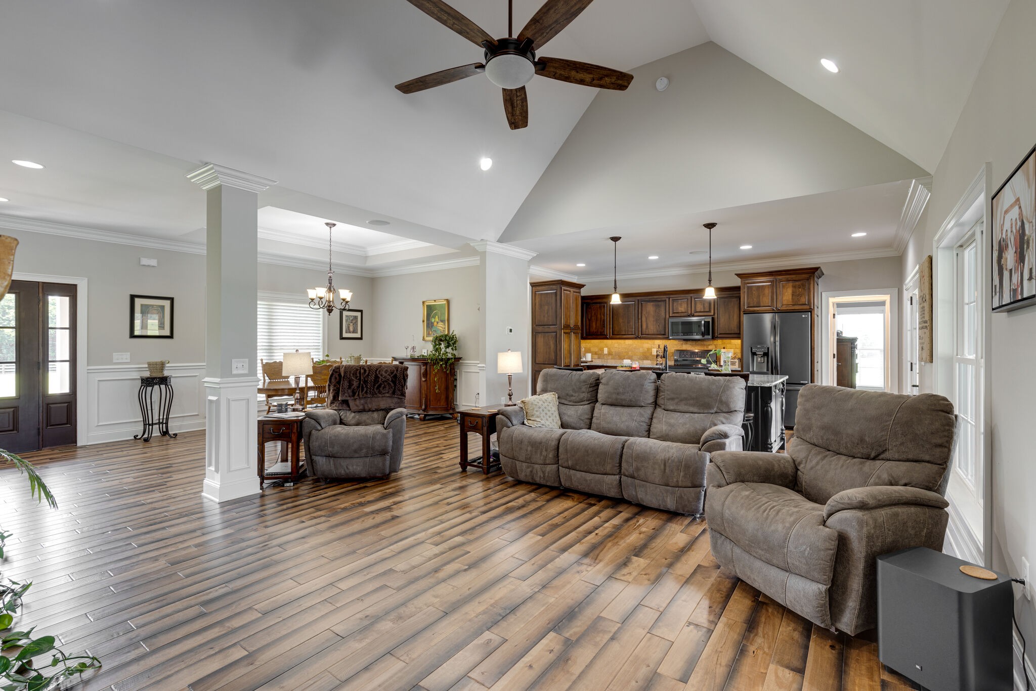 3165 Les Chappell Road Spring Hill, TN 37174 - Photo 8 of 70 a living room with furniture kitchen view and a wooden floor