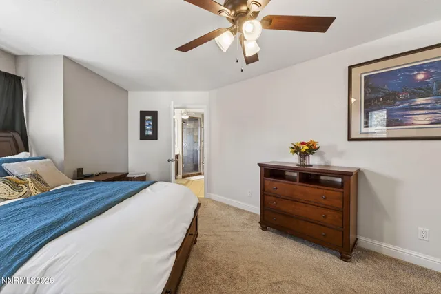 a bedroom with a bed and furniture