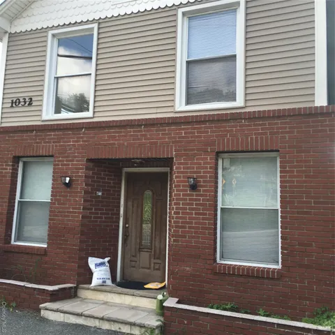 a front view of a house with a window
