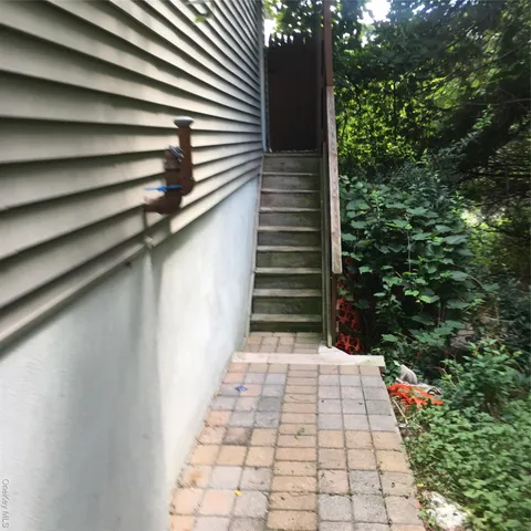 a backyard of a house with lots of green space