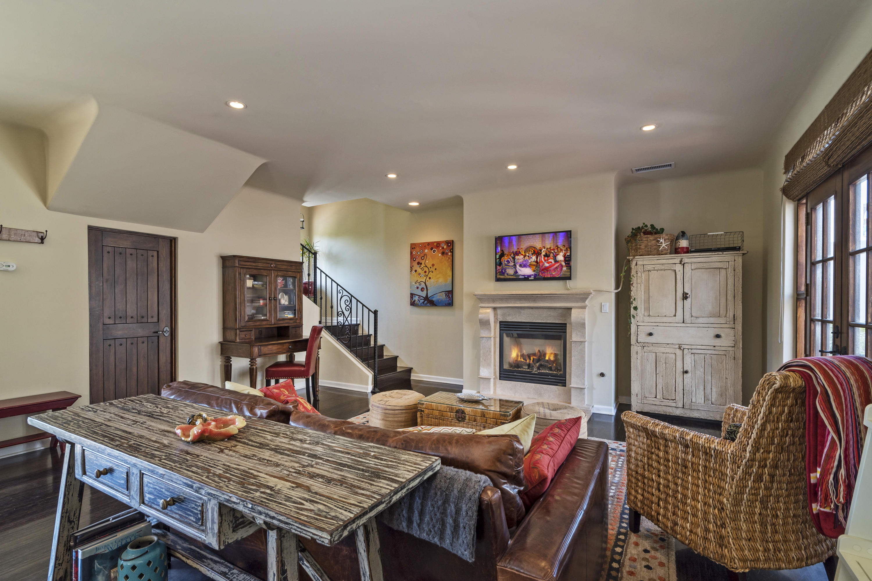 4004 Via Lucero, Unit 7 Santa Barbara, CA 93110 - Photo 3 of 14 a living room with furniture and a fireplace