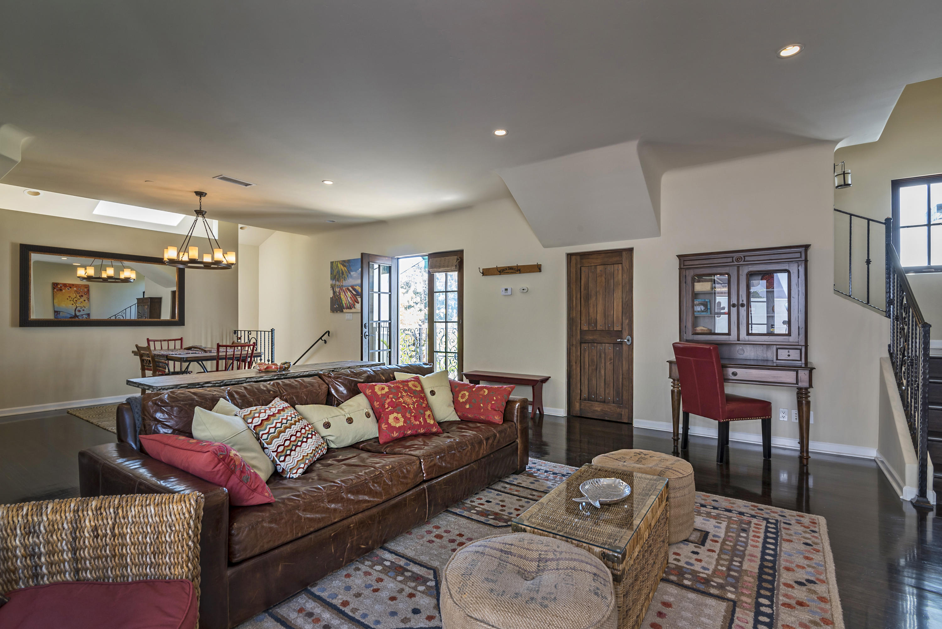 4004 Via Lucero, Unit 7 Santa Barbara, CA 93110 - Photo 4 of 14 a living room with furniture and wooden floor