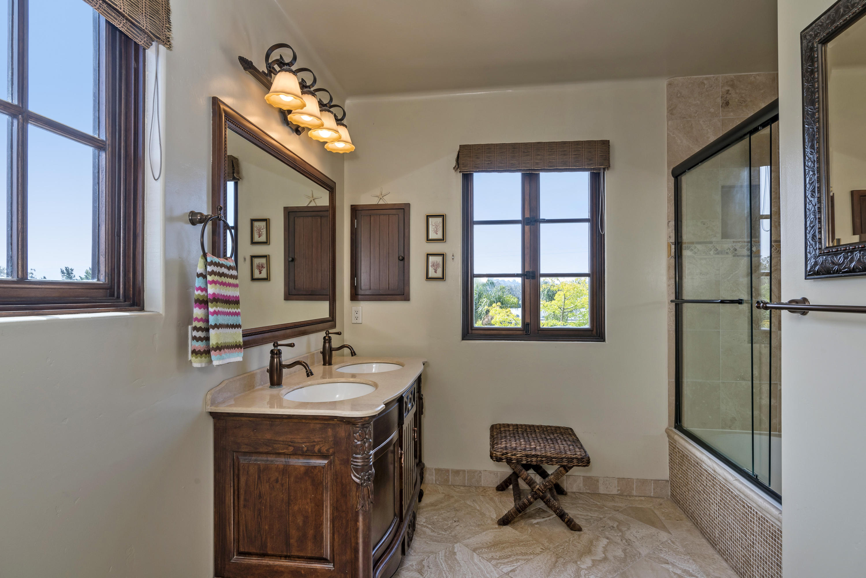4004 Via Lucero, Unit 7 Santa Barbara, CA 93110 - Photo 7 of 14 a bathroom with a sink a vanity and a mirror
