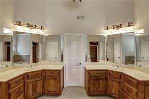 802 Pathview Court Dacula, GA 30019 - Photo 49 of 56 a bathroom with a double vanity sink mirror and double