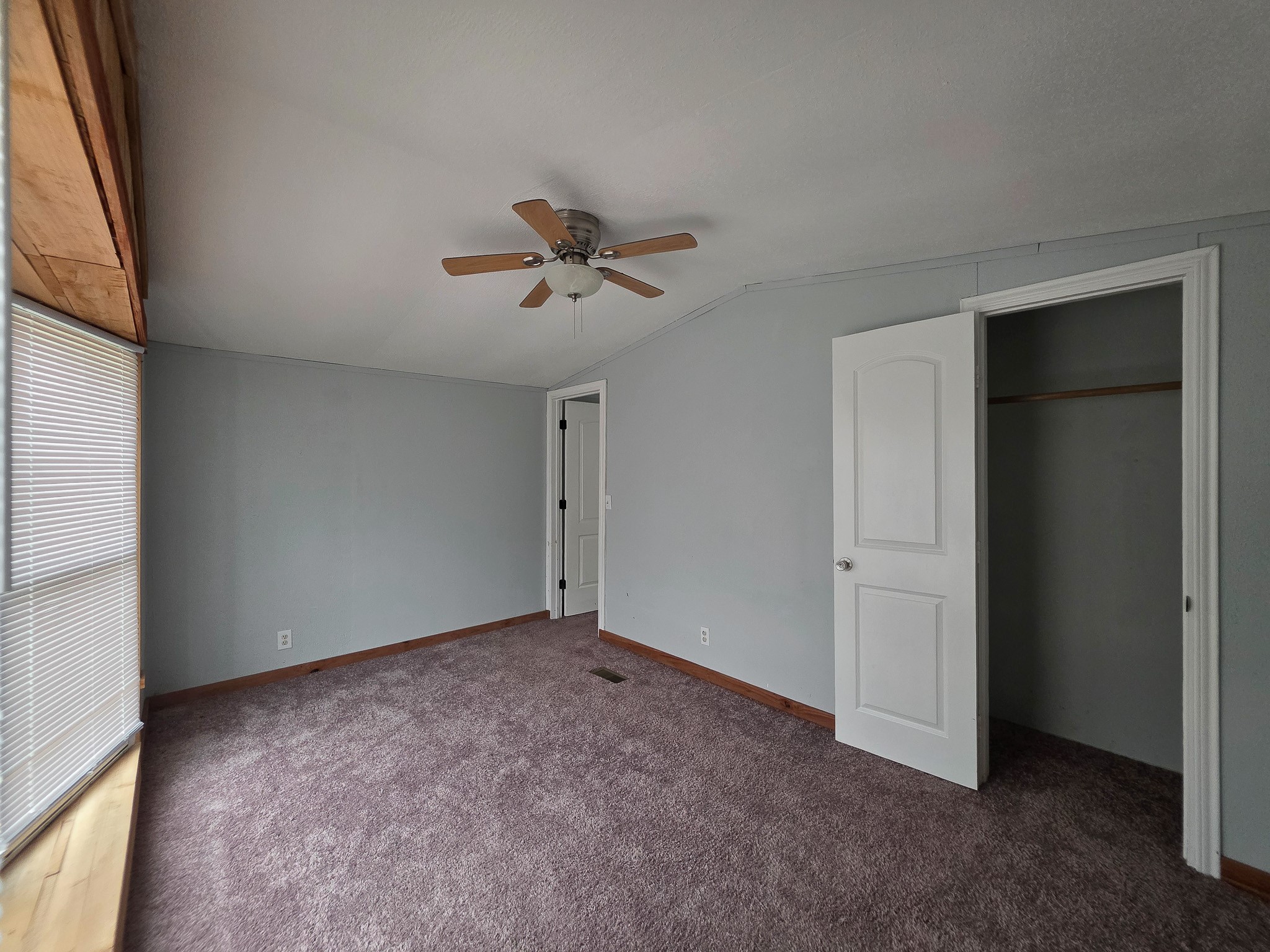 344 Holmes Road Onalaska, TX 77360 - Photo 5 of 25 331 Holmes, one of the three bedrooms.