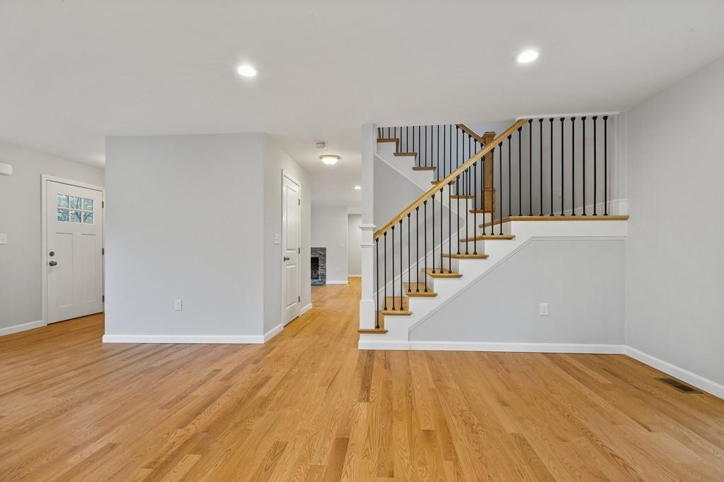 6 Sheffield Road Framingham, MA 01701 - Photo 16 of 32 a view of entryway with wooden floor