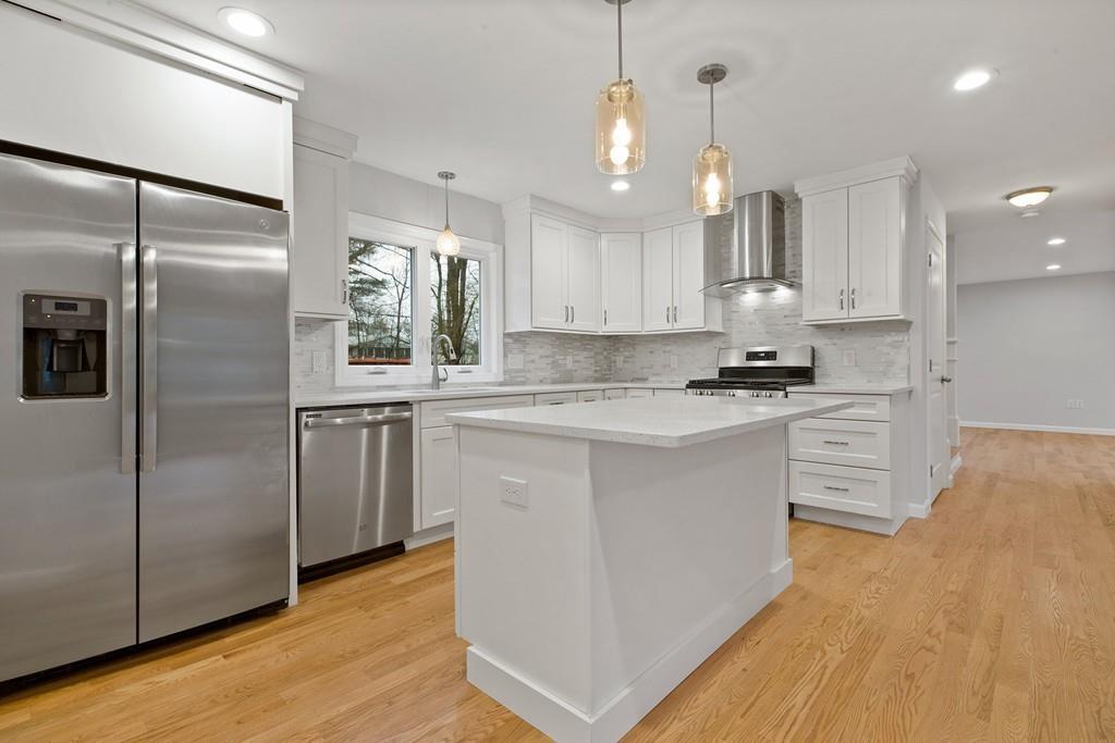 6 Sheffield Road Framingham, MA 01701 - Photo 3 of 32 a kitchen with stainless steel appliances a refrigerator sink and microwave