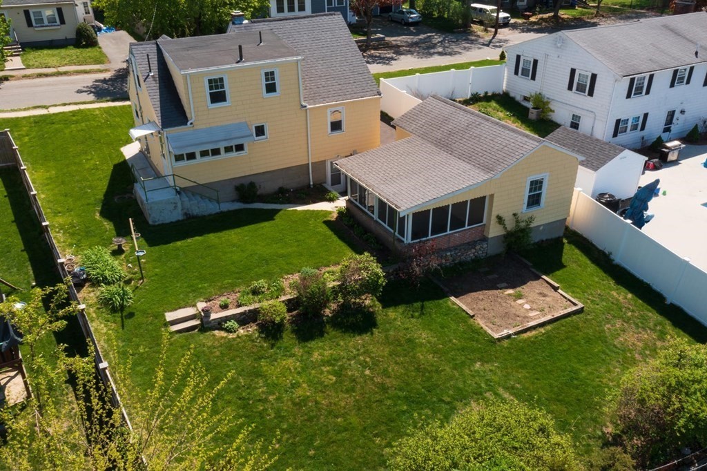 24 Endicott Road Stoneham, MA 02180 - Photo 12 of 15 an aerial view of a house with a garden