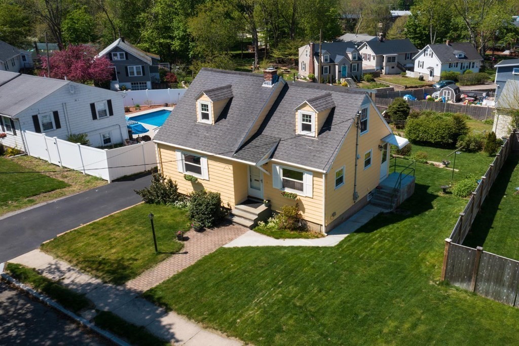 24 Endicott Road Stoneham, MA 02180 - Photo 13 of 15 an aerial view of residential houses with outdoor space and parking
