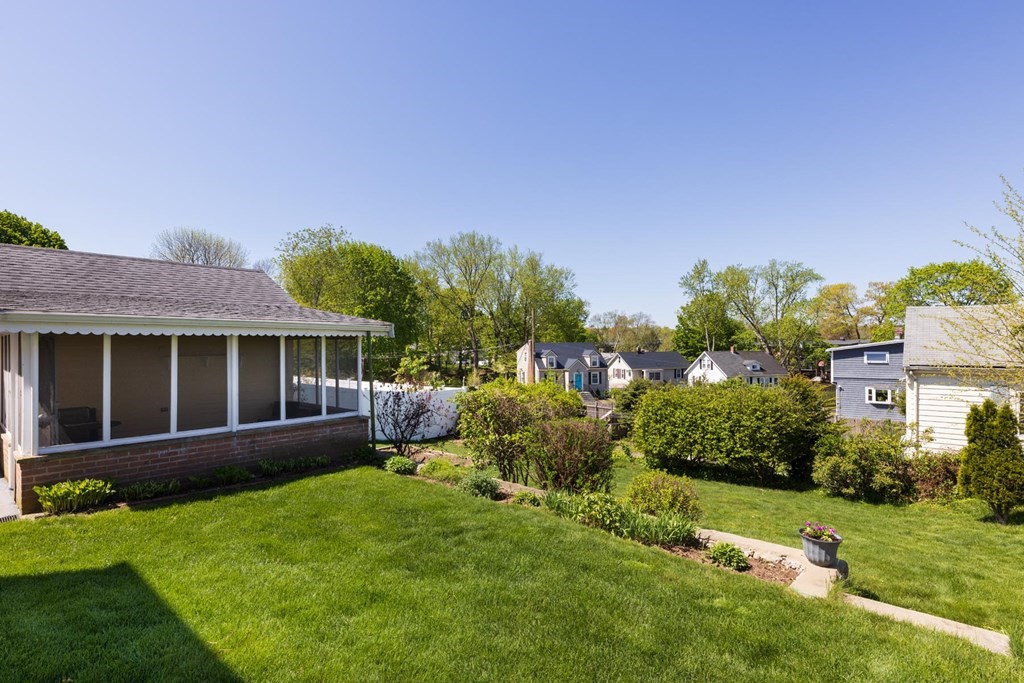 24 Endicott Road Stoneham, MA 02180 - Photo 14 of 15 front view of a house with a yard