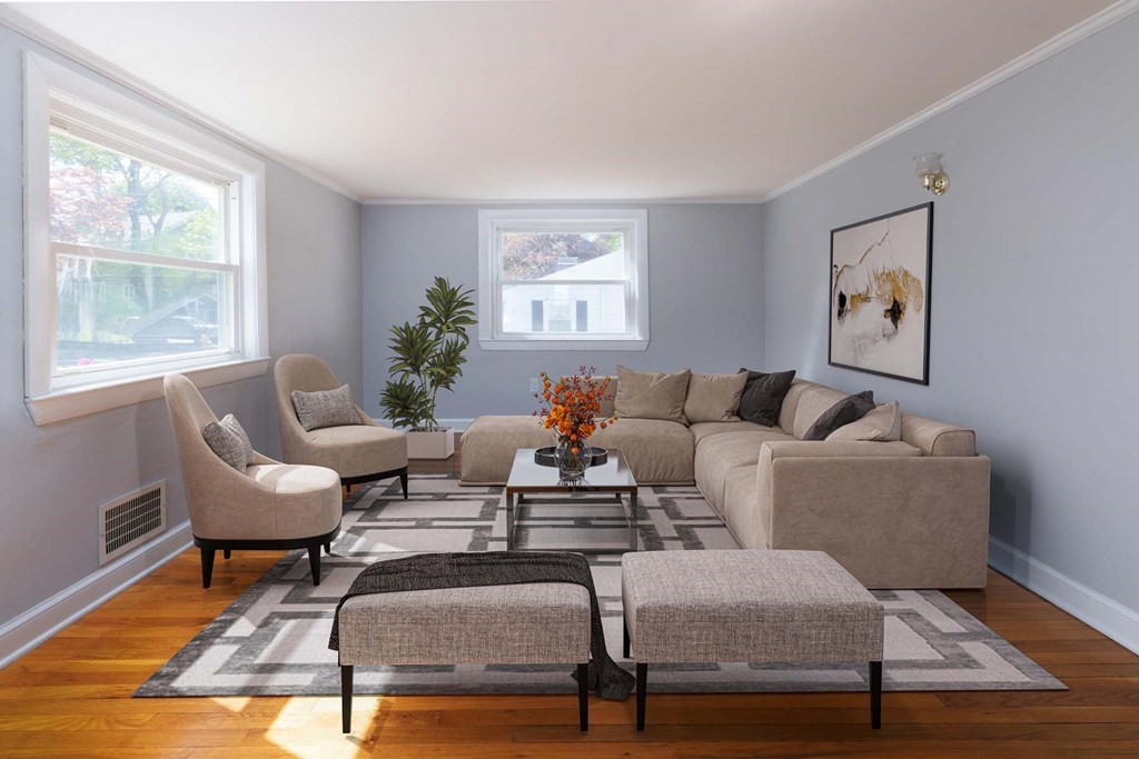 24 Endicott Road Stoneham, MA 02180 - Photo 2 of 15 a living room with furniture and wooden floor
