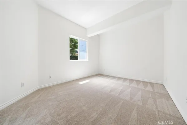 a bathroom with a sink toilet a mirror and shower