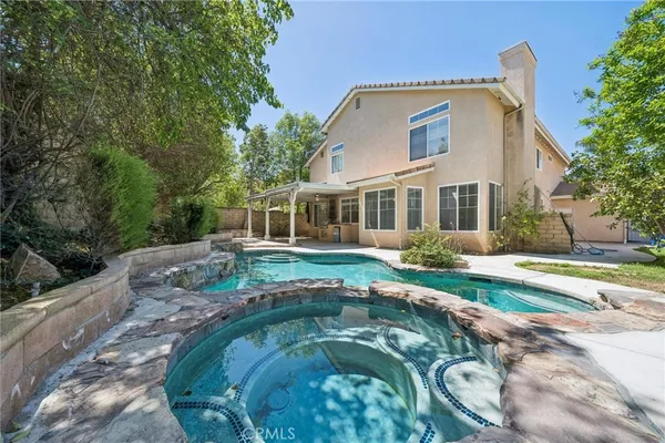 a view of street with mountain view and sitting space