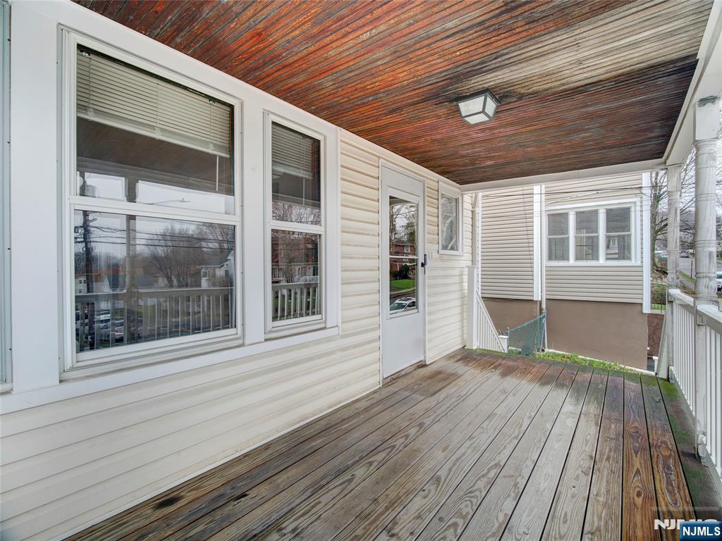 140 Westervelt Avenue Hawthorne, NJ 07506 - Photo 18 of 36 a view of a house with a balcony